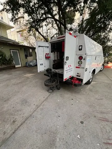 Magnet Plumbing service vehicle on-site for Grease Trap Cleaning in North Lauderdale